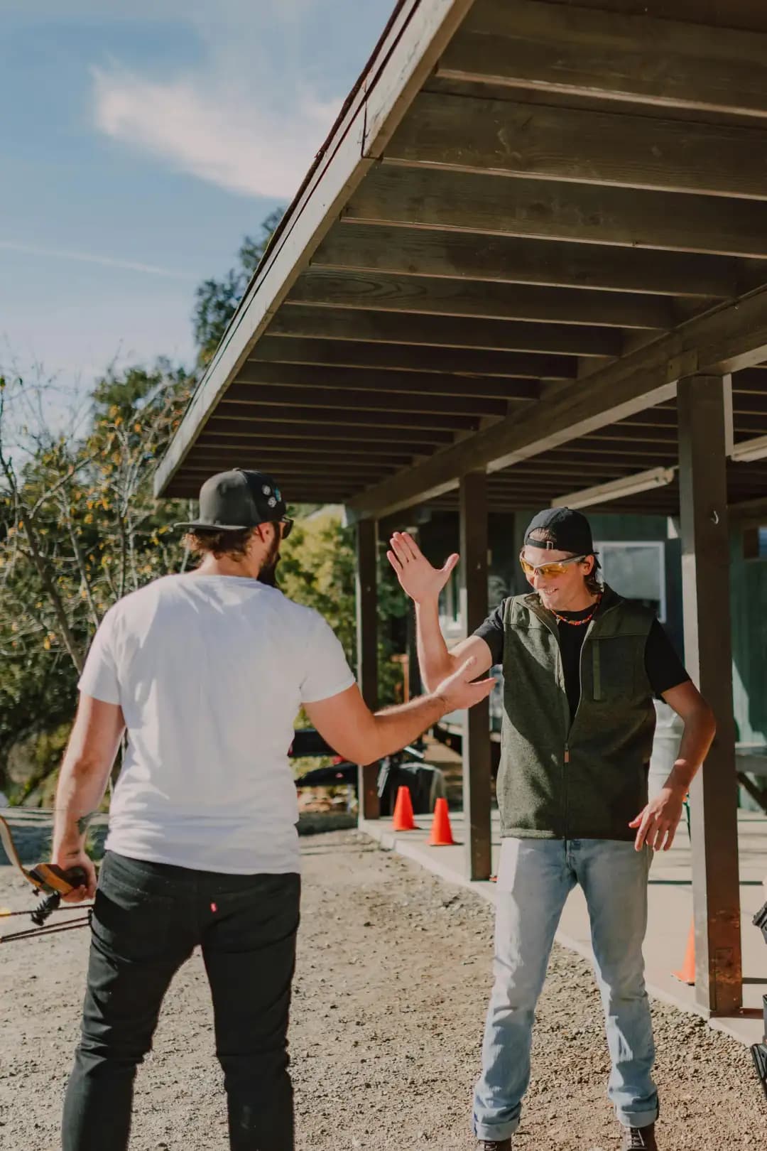 Professional automotive garage with vehicle on hydraulic lift and diagnostic tools, no humans appears in the image